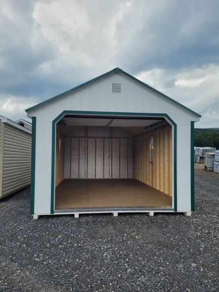 A white single-car garage with the door open.