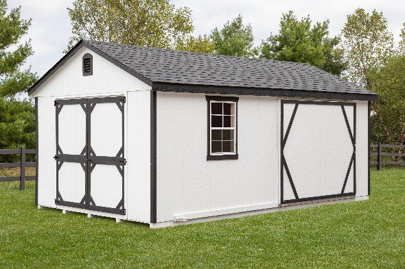 white a-frame shed with gray trim